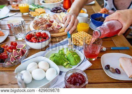 Food On The Table.laid Table With Food.breakfast On The Terrace.avocado Croutons.healthy Breakfast.j