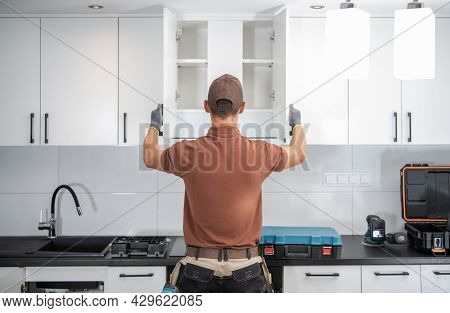 Modern White Kitchen Cabinets Installation Finished By Professional Cabinetmaker In His 40s. Furnish