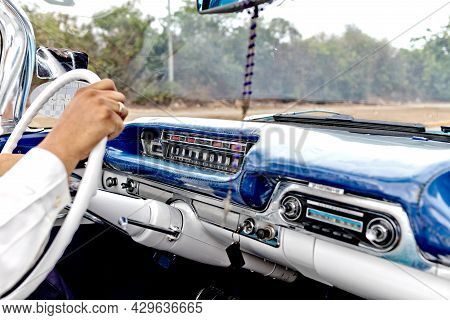 Convertible, Dashboard Of A Retro Car. Hand On The Wheel