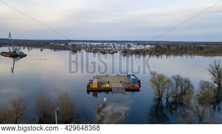 Ancient, Manual Crossing Over The River. The Car Is Transported Across The River In A River Ferry. T