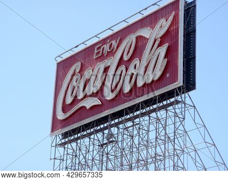 San Francisco - June 29, 2009: Enjoy Coca-cola Neon Sign During The Day Against A Blue Sky.  The Dis