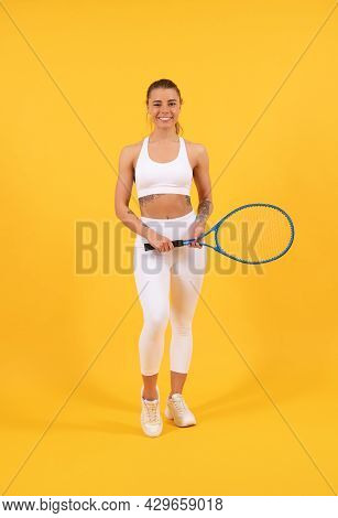 Summer Activity. Cheerful Young Girl In Sportswear With Racket. Sportswoman.