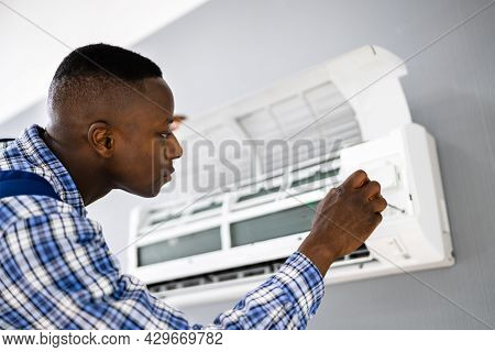 Ac Electrician Technician Repairing Air Conditioner Appliance