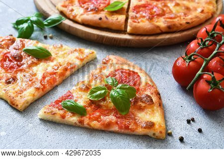 Slice Pizza With Sauce, Cheese And Basil. Cassic Pizza Margarita.