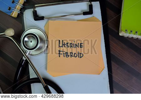 Uterine Fibroid Write On Sticky Notes Isolated On Wooden Table.