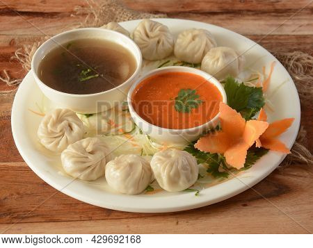 Combo Of Veg Steam Momo And Veg Soup, Nepalese Traditional Dish Momo Stuffed With Vegetables And The