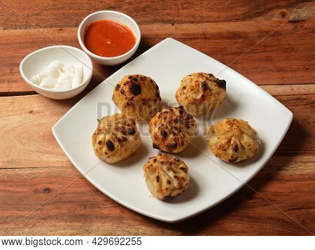 Veg Tandoori Momo. Nepalese Traditional Dish Momo Stuffed With Vegetables And Then Cooked And Served