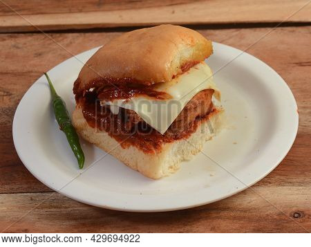 Cheese Vada Pav, Mumbai Famous Vada Paav Is An Indian Burger. Potato Patty Is Deep Fried And Stuffed