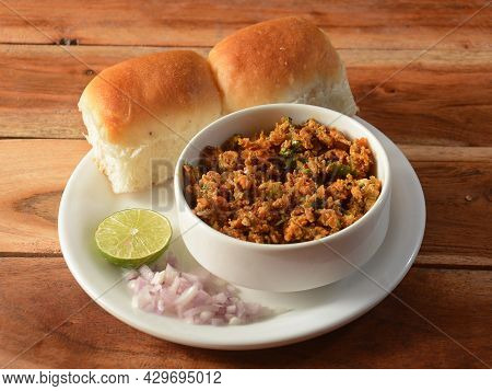Paneer Bhurji With Pav Is A Spicy Paneer Curry Dish Made Up Of Paneer, Onion, Tomatoes And Indian Sp