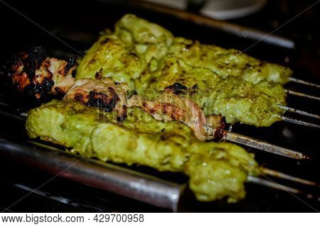 Selective Focus Image On Chicken Reshmi Kebab And Chicken Haryali Kebab On Barbeque Grill.