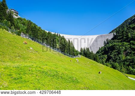 Huge Concrete Apline Dam On Sunny Summer Day. Zillergrundl Speicher, Zillertal Alps, Austria