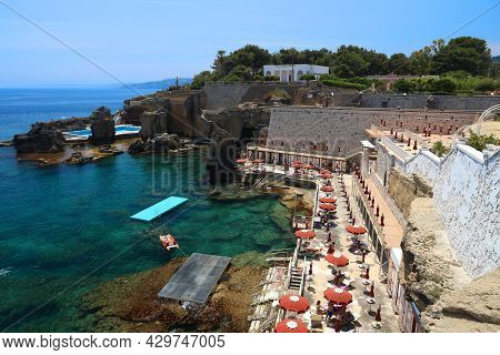 Salento, Italy - June 2, 2017: People Visit Sea Baths In Santa Cesarea Terme Spa Town Of Salento Pen