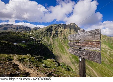 Direction Signs At Timmelsjoch High Alpine Road In The Austrian Alps Also Called Passo Rombo - Trave