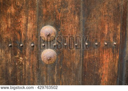 Rusted Stake Of Ancient Door Lock On Old Wooden Main Castle Door