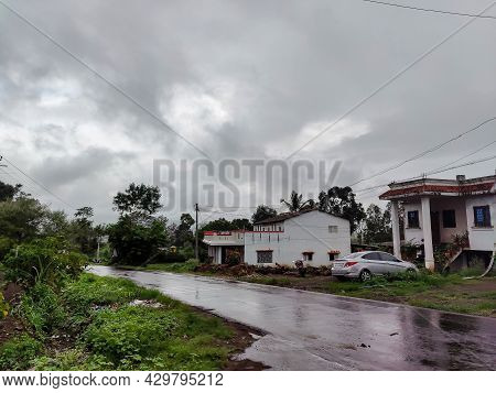 Kolhapur, India - August 14, 2021; Stock Photo Of White Painted Bungalow With Red Color Tiles On Roo