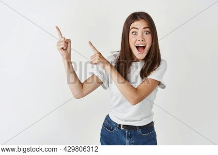 Great News Hey Take Look. Excited Happy And Surprised Beautiful Young Woman Turn Yout Attention At B