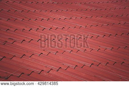 Close Up Roof Surface Of The Temple In Thailand. Soft Focus
Red Tiles Roof For Background.