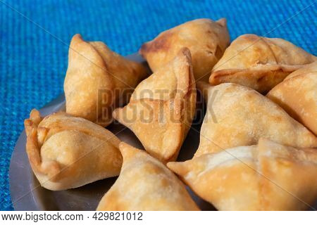 Homemade Samosa, Samsa Or Smosa. A Vegetarian Spicy Indian Special Traditional Street Food. Iftaari 