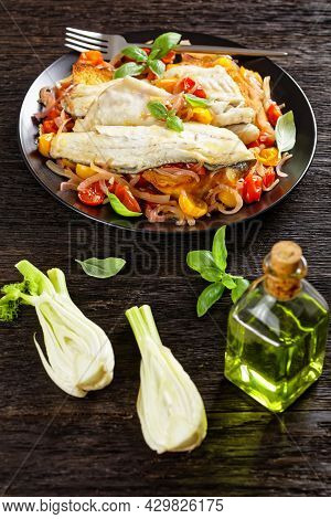 Acqua Pazza, Italian Poached Fish In A Tomato And White Wine Based Sauce With Fennel, Herbs And Cris