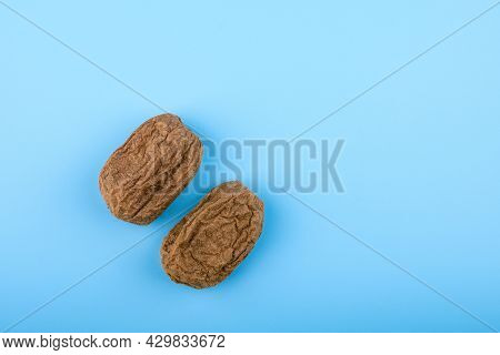 Two Old Shriveled Kiwis That Look Like Male Testicles. Caring For Men's Health