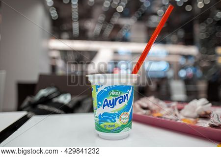Sisli, Istanbul, Turkey - 07.13.2021: Selective Focus Of Sutas Ayran Plastic Glass And Drinking Stra