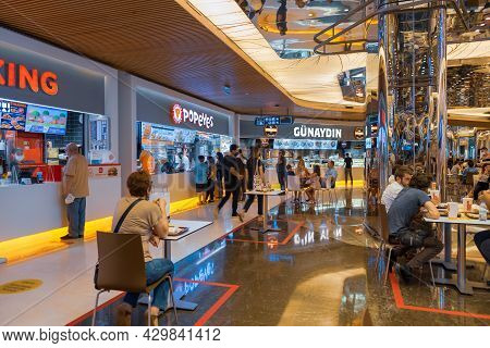 Sisli, Istanbul, Turkey - 07.13.2021: Several Costumers Sitting Eating And Waiting In Line Of Food R