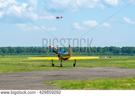 Gorodok. Ukraine. June 6, 2021. Tsuniv Airfield. Training Aircraft, Taxiing To The Runway. Sport Ext