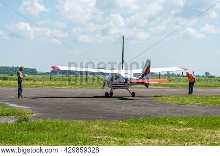 Gorodok.ukraine. June 6, 2021. Tsuniv Airfield. Training Aircraft, Preparation For The Flight. Pilot