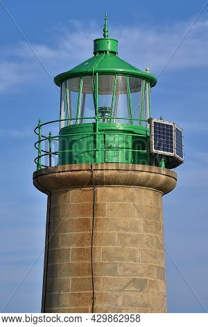 Beautiful Closeup Vertial Evening View Of Green West Pier Lighthouse In Dun Laoghaire Harbor, Dublin