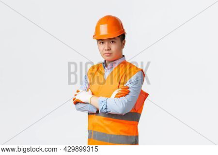 Building Sector And Industrial Workers Concept. Confident Serious-looking Asian Chief Engineer, Arch