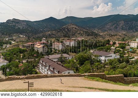 The Republic Of Crimea. July 12, 2021. A Picturesque View Of The City Of Sudak From The Height Of Th