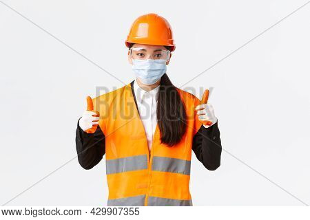 Covid-19 Safety Protocol At Enterpise, Construction And Preventing Virus Concept. Confident Female A