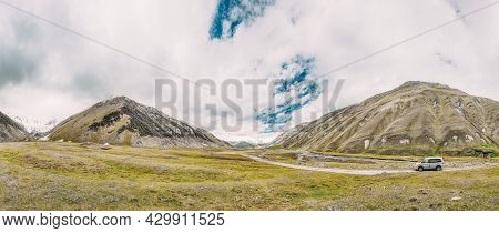 Suv Car On Off Road In Spring Mountains Landscape In Truso Gorge, Georgia. Drive And Travel Concept.