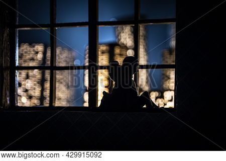 A Realistic Dollhouse Living Room With Furniture And Window At Night. Romantic Couple Sitting On Win