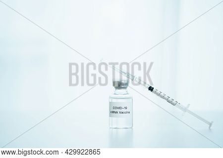 Coronavirus 2019 Or Sars 2019-ncov Cure Vaccine In Mrna Technology And Medical Needle Close Up. Mrna