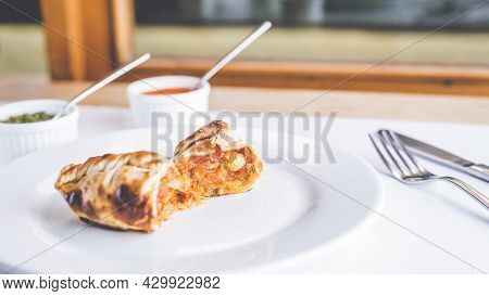 Traditional Argentinian Food Called Empanada In A Restaurant
