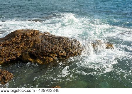 Waves Breaking On The Rocks Of Ponta Do Humaitá.