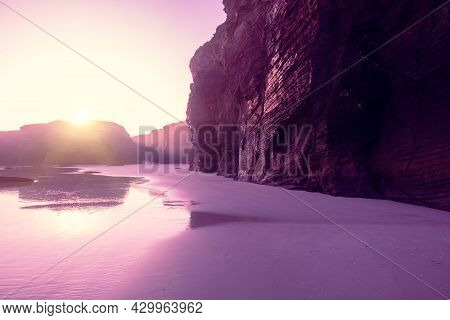 Seascape In The Morning. Rocky Sea Coast At Sunrise. As Catedrais Beach. Beach Playa De Las Catedral