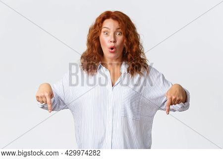 Excited And Impressed Middle-aged Female Entreprenuer, Redhead Woman React To Amazing Promo Offer, P