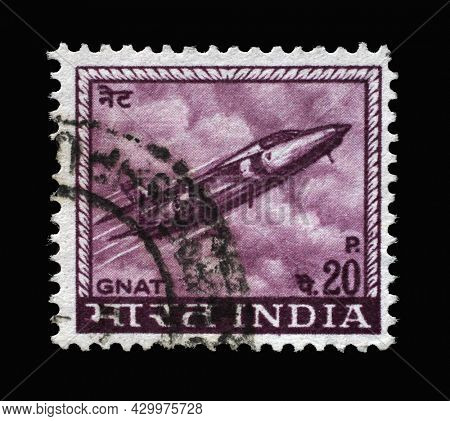 ZAGREB, CROATIA - SEPTEMBER 13, 2014: Stamp printed in India shows Gnat jet fighter, made in India by Hindustan Aircraft Industries, circa 1967