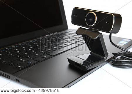 Black Computer Webcam On Notebook Keyboard. Smartwork