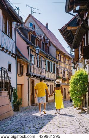 Eguisheim, Alsace, France, Traditional Colorful Halt-timbered Houses In Eguisheim Old Town On Alsace