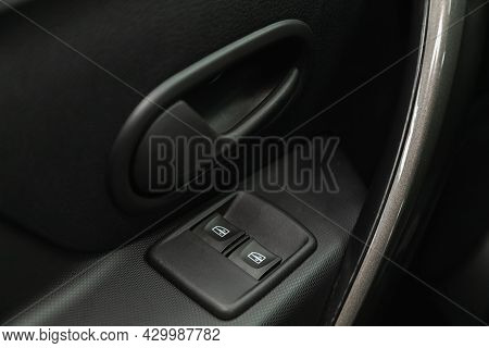 Novosibirsk, Russia - July 15, 2021:   Renault Logan Crossway, Car Door Interior Armrest With Window