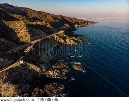 Spanish Rocky Coastline With Camper Car Camping On Cliff Sea Shore. Mediterranean Region Of Villaric