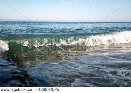 Sea Wave In Back Sunlight With Place For Text. Clean Environment
