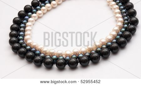 Black, blue and white pearl necklaces