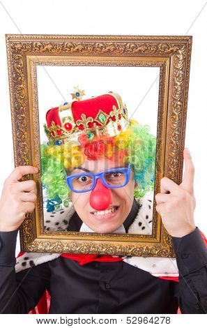 Businessman with crown isolated on white