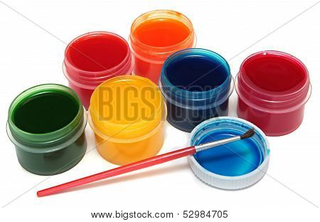 Children's paints in jars and brush