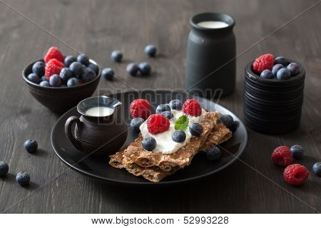 crisp bread with creme fraiche and berries 
