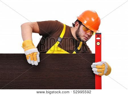 Builder Measures The Surface On A White Background